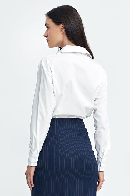 Nife shapewear bodysuit showcasing long sleeves and a button closure, designed to enhance the feminine silhouette while ensuring breathability and comfort.