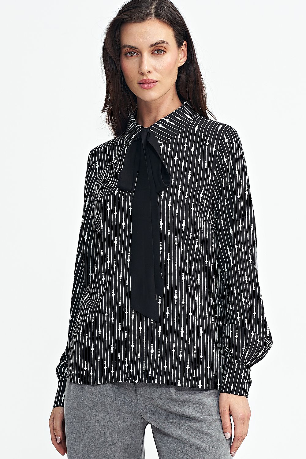 Elegant long sleeve viscose shirt with collar and sash, designed by Nife, showcasing a unique pattern and luxurious feel.