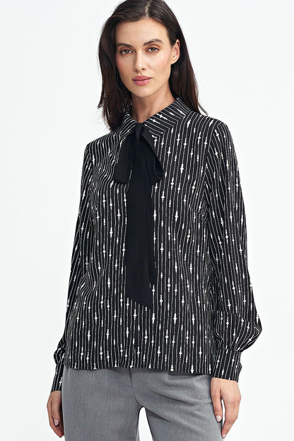Elegant long sleeve viscose shirt with collar and sash, designed by Nife, showcasing a unique pattern and luxurious feel.