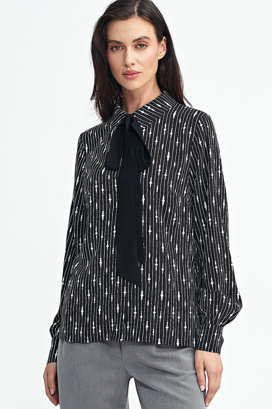 Elegant long sleeve viscose shirt with collar and sash, designed by Nife, showcasing a unique pattern and luxurious feel.
