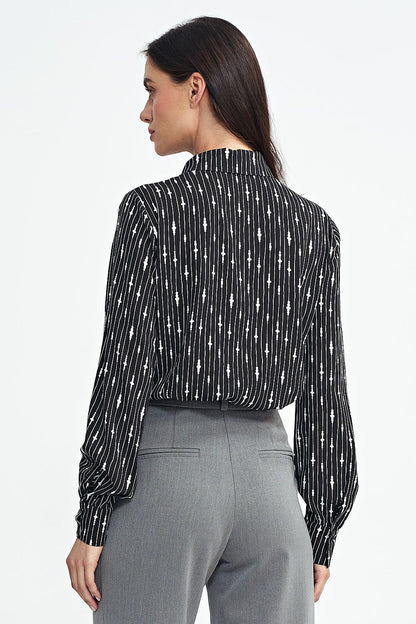 Fashionable long sleeve viscose shirt by Nife displayed in multiple sizes, reflecting chic style and comfortable fit.