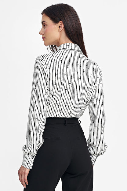 Model wearing an elegant Nife long sleeve viscose shirt with a stylish black sash, demonstrating versatility and chic style in women's clothing.