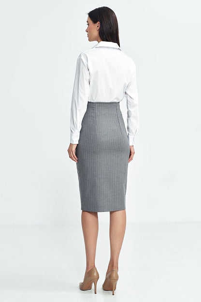 Chic below-the-knee high-waisted skirt by Nife, featuring a sophisticated slit and distinctive button closure, ideal for elegant occasions.