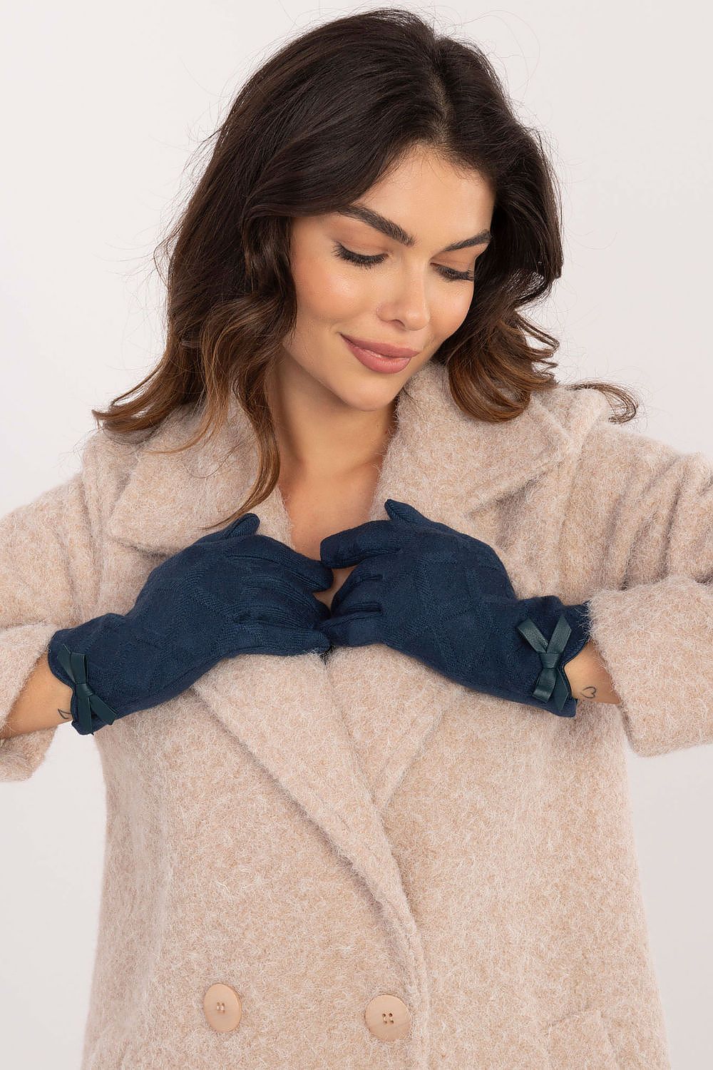 Warm, elegant gloves for women by AT, featuring a beautifully embroidered index finger for easy phone use without removing the gloves.