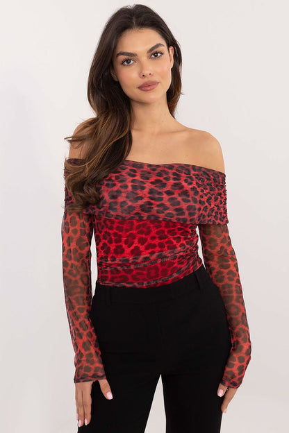 Elegant animal print blouse by Italy Moda featuring a Spanish neckline and long sleeves, perfect for sophisticated styling.