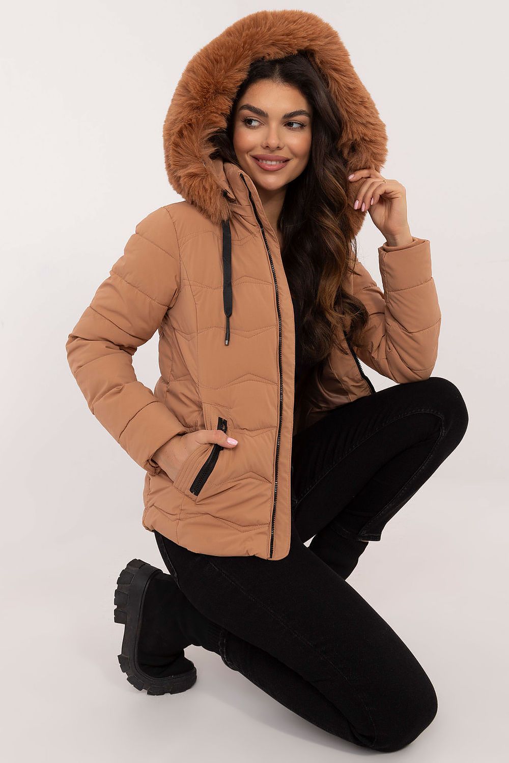 Premium Women's Quilted Jacket with integrated hood and zippered pockets, available in various sizes from Factory Price.