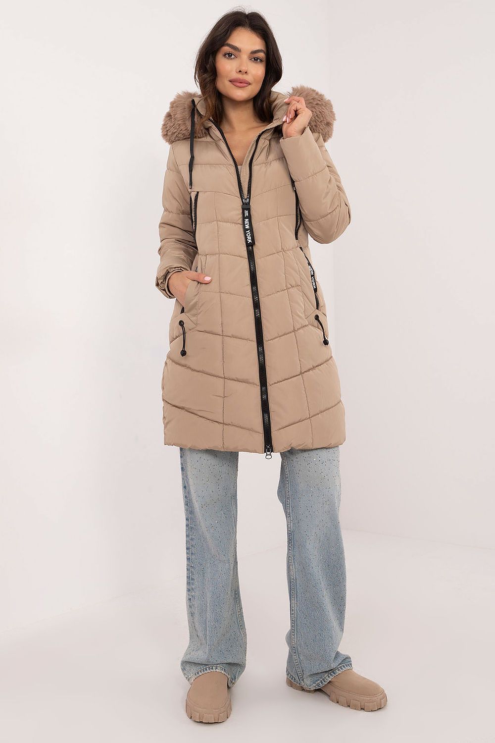 Side view of Factory Price luxury knee-length jacket with detachable hood and fur, showcasing its elegant quilted design.