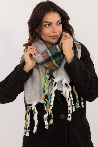 Luxurious 182 cm long polyester scarf with decorative tassels by AT, ideal for warmth and sophistication in cold weather.