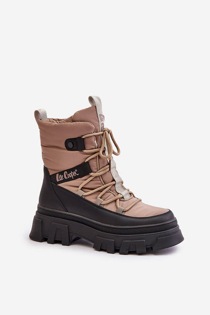 Elegant and functional Lee Cooper snow boots for women, featuring a sleek zip closure and cozy lining, perfect for cold weather fashion and outdoor excursions by Step in Style.
