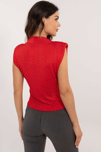 Refined sleeveless blouse by Italy Moda, adorned with decorative jets and perfectly tailored for a graceful silhouette.