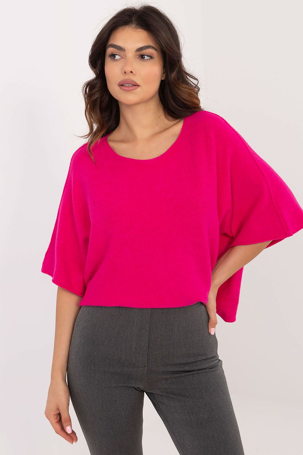 Elegant oversized reversible short sleeve women's sweater by BFG, showcasing its luxurious design and modern short length.