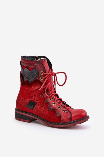 Close-up of Maciejka women's leather boots showcasing exquisite craftsmanship, robust stitching, and a stylish rounded toe for a sophisticated look.