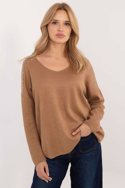 Elegant women's rhinestone embellished sweater by Italy Moda, showcasing a sophisticated blend of viscose and spandex, perfect for versatile styling.