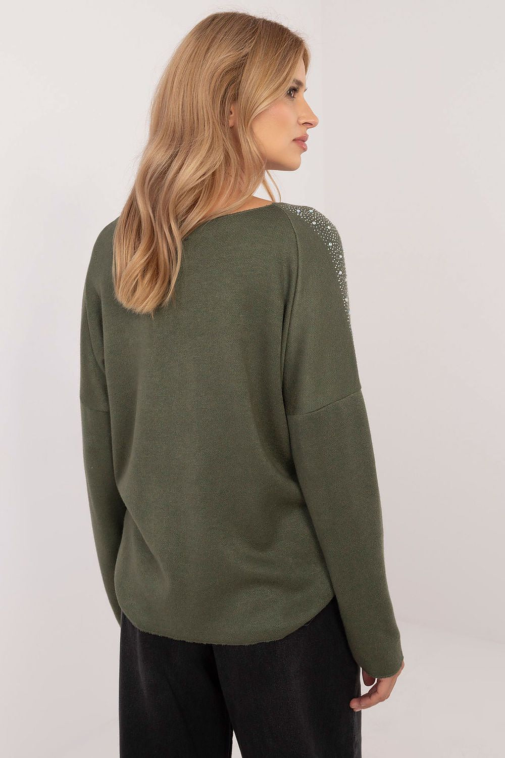Detailed view of the fabric texture of the elegant women's sweater by Italy Moda, showcasing the luxurious viscose and spandex blend that ensures all-day comfort.
