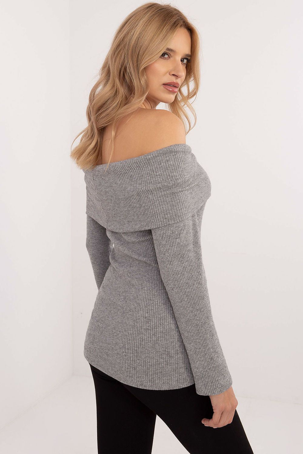 Close-up view of the ribbed texture of Italy Moda's Off-The-Shoulder Women's Sweater, highlighting its elegant design and high-quality fabric.