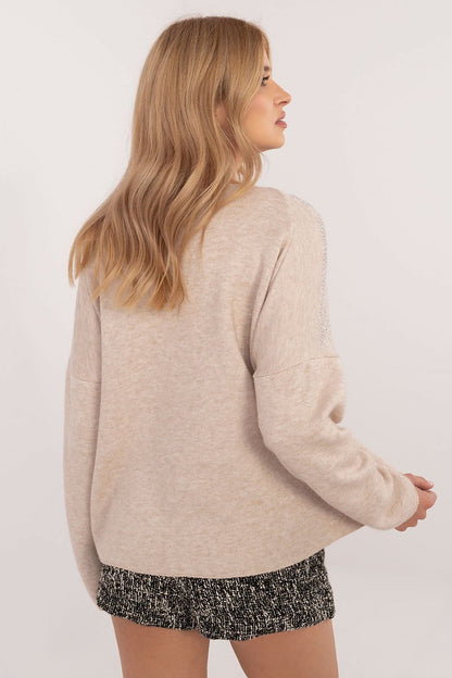 Sophisticated women's sweater designed by Italy Moda, featuring elegant rhinestone embellishments suitable for formal and office settings, crafted from a comfortable viscose and spandex blend.