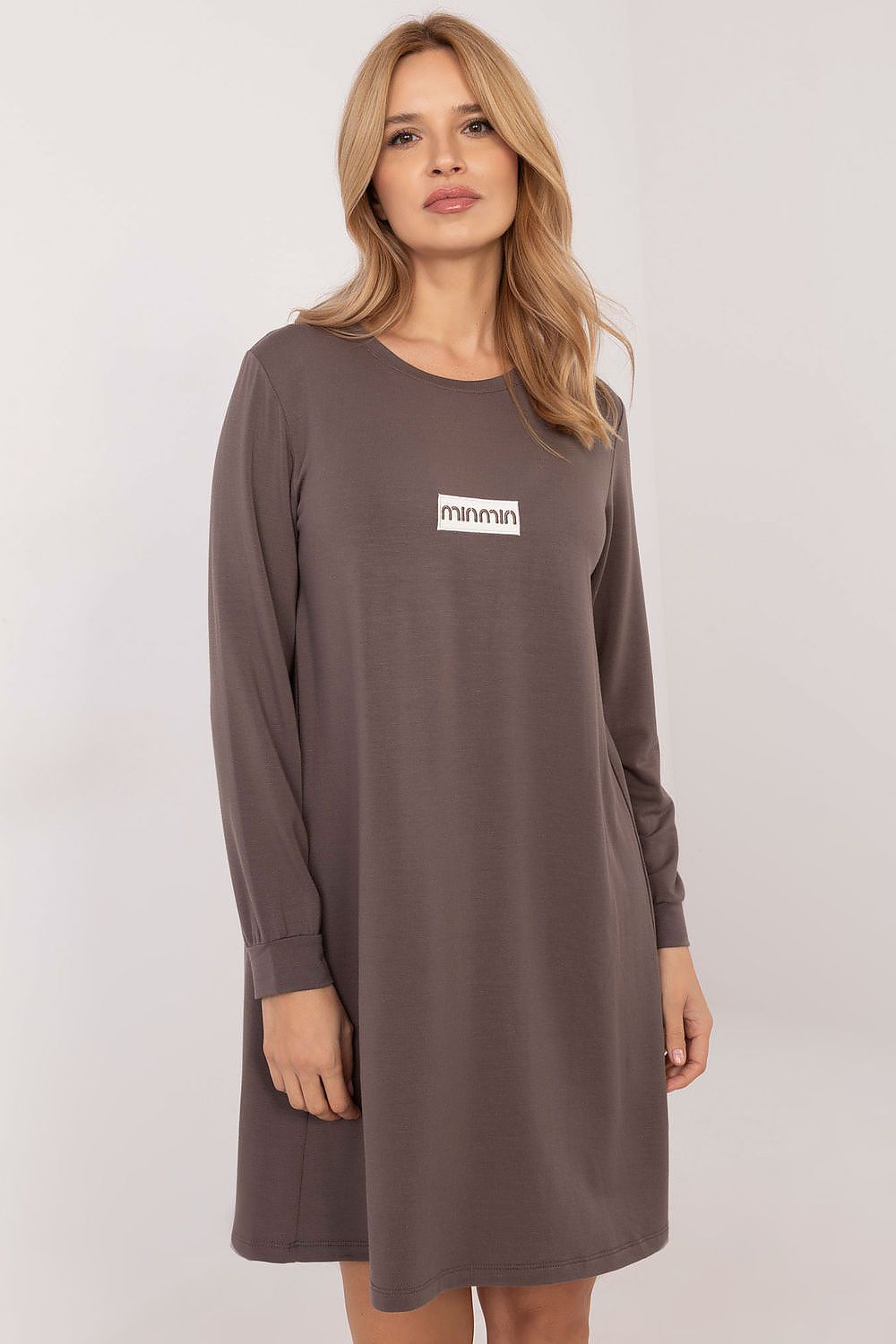 Elegant casual sweat dress by Relevance in soft micro modal, featuring a flared cut and stylish patches, perfect for chic everyday dressing.