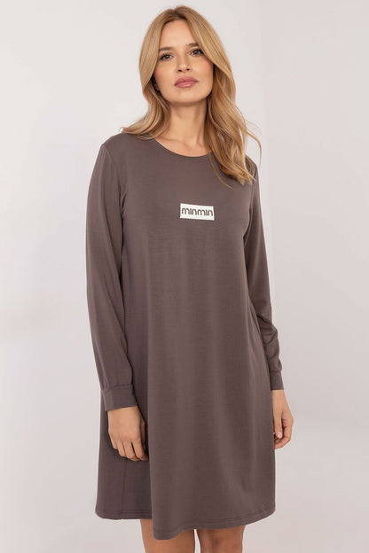 Elegant casual sweat dress by Relevance in soft micro modal, featuring a flared cut and stylish patches, perfect for chic everyday dressing.