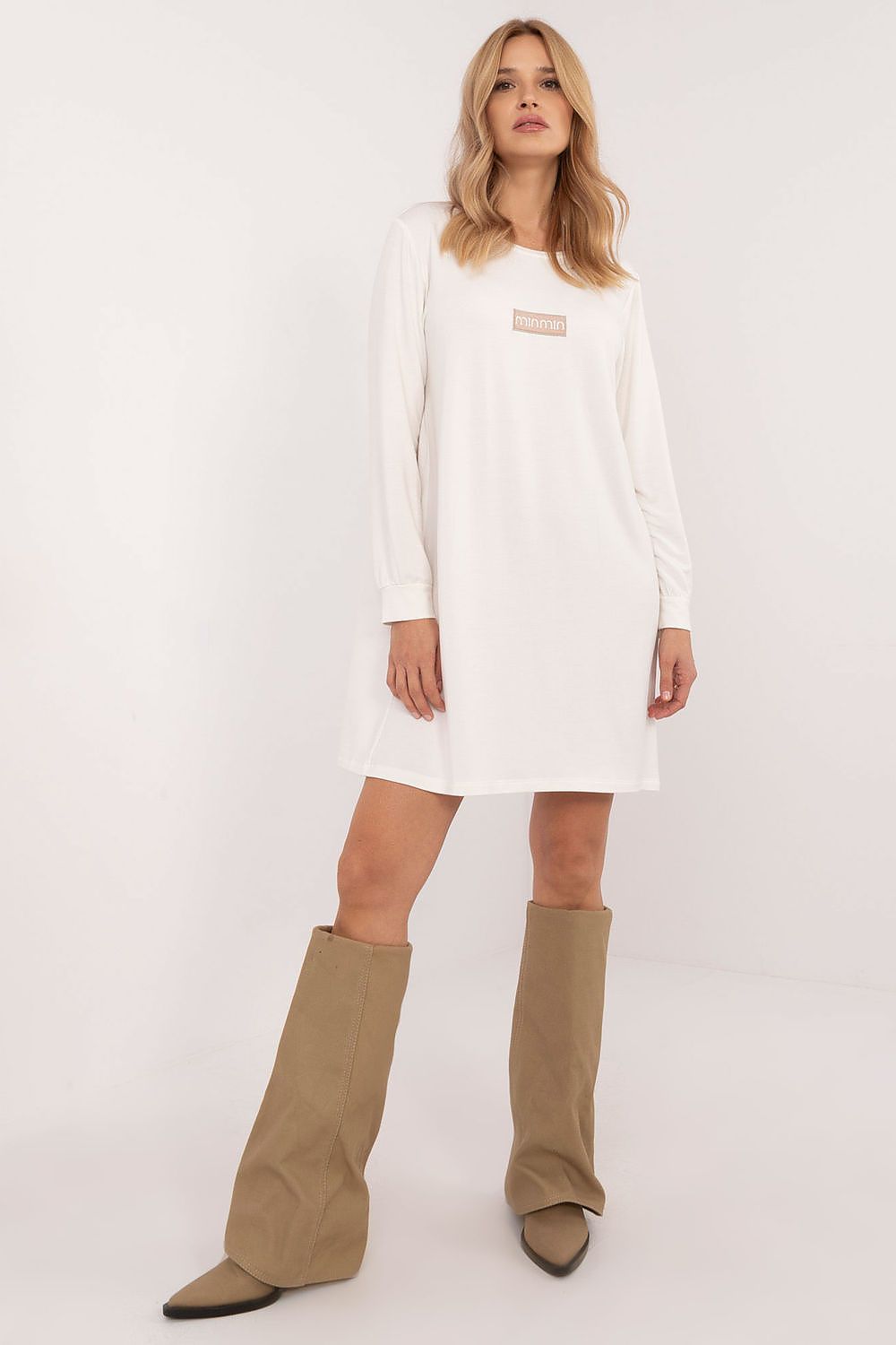 Sophisticated long sleeve sweat dress from Relevance, made with airy modal material, featuring a minimalist design and flared silhouette for a feminine touch.