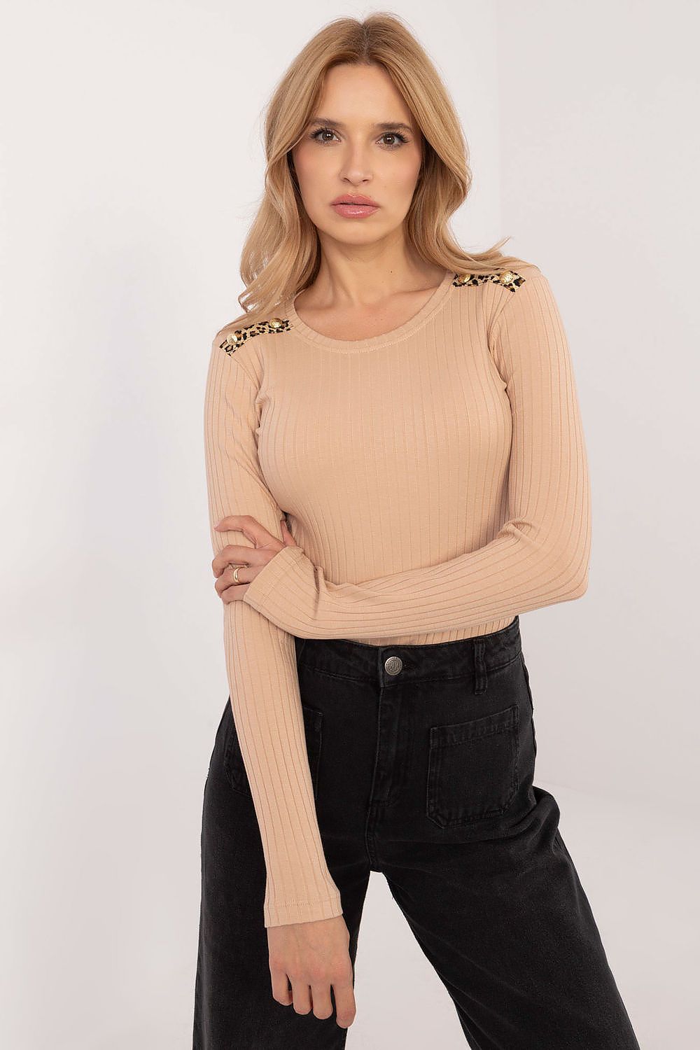 Elegant fitted ribbed blouse by Relevance featuring a striking animal motif and button details, perfect for modern style and comfortable wear.