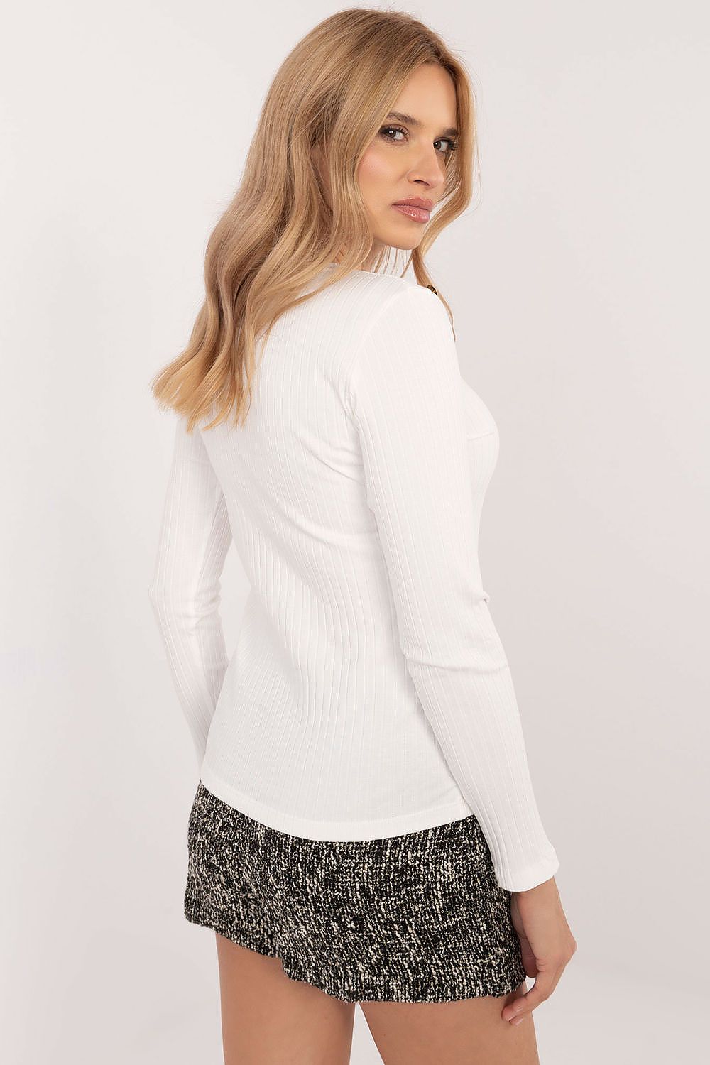 Elegant ribbed blouse by Relevance featuring a unique heart neckline and subtle animal motif, perfect for sophisticated everyday wear.