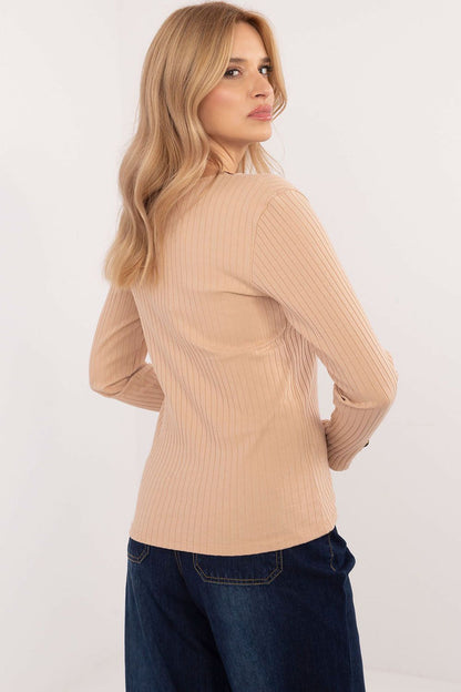 Back view of Relevance's elegant ribbed blouse, highlighting the smooth design and luxurious fabric blend, tailored for a perfect fit.