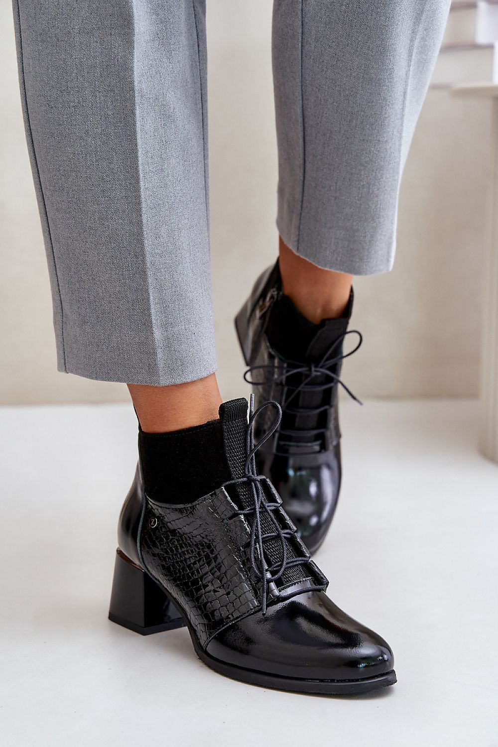 Refined natural leather heel boots featuring a stunning animal pattern, expertly crafted by Step in Style, ideal for elegant seasonal outfits.