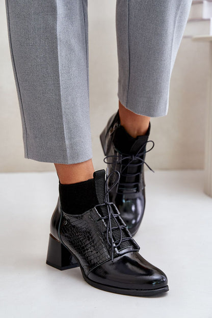 Refined natural leather heel boots featuring a stunning animal pattern, expertly crafted by Step in Style, ideal for elegant seasonal outfits.