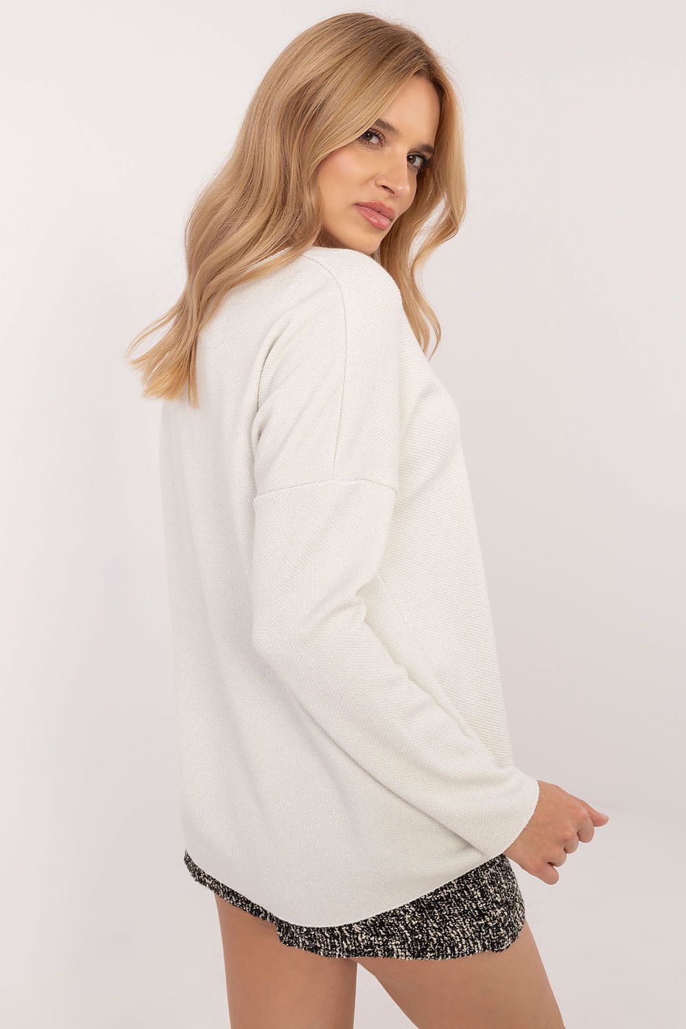Elegant women's V-neck sweater with shiny thread and textured pattern by Italy Moda, showcasing a luxurious design perfect for chic outfits.