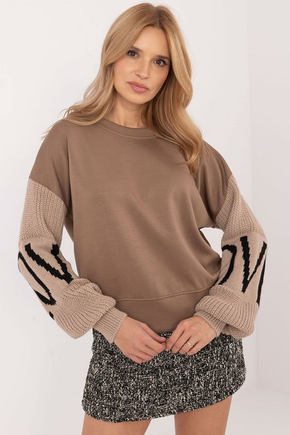 Luxurious women's casual sweatshirt by Italy Moda in minimalist style, showcasing soft polyester blend fabric and elegant round neckline, ideal for chic everyday wear.
