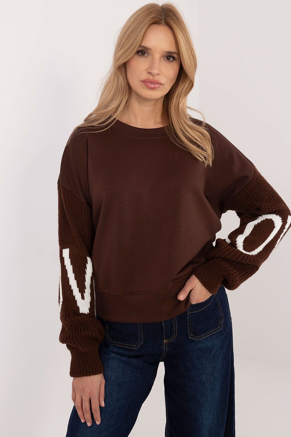 Close-up of Italy Moda women's sweatshirt highlighting the soft texture and modern design, perfect for fashion-forward women seeking comfort and style in their daily wardrobe.