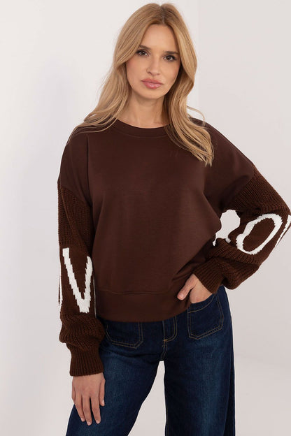 Close-up of Italy Moda women's sweatshirt highlighting the soft texture and modern design, perfect for fashion-forward women seeking comfort and style in their daily wardrobe.