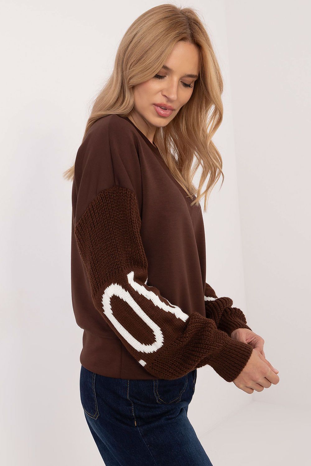 Stylish Italy Moda women's casual sweatshirt displayed on a mannequin, emphasising its contemporary minimalist appeal and ideal fit for EU size 0, suitable for everyday elegance.
