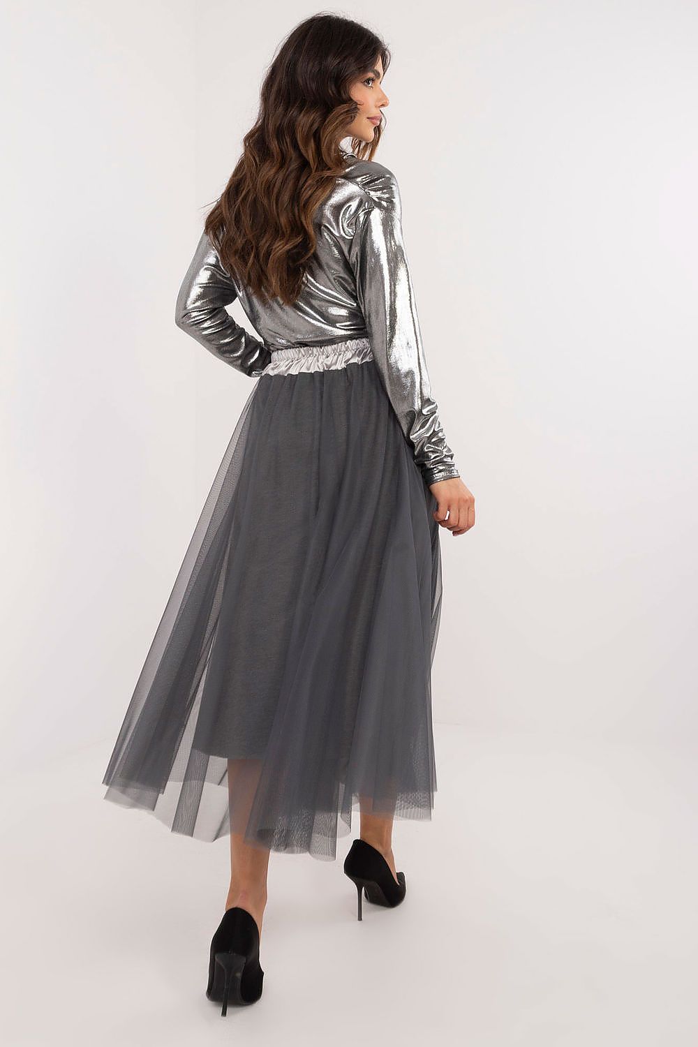 Model wearing Italy Moda's Elegant Casual Tulle Midi Skirt in EU size 0, demonstrating its sophisticated style and versatile look for elegant occasions.