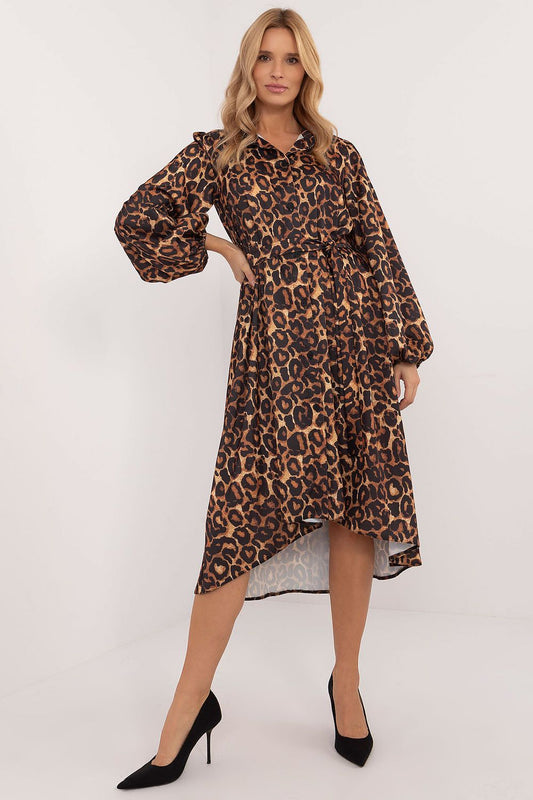 Luxurious midi length asymmetrical shirt dress in animal print by Lakerta, featuring a classic collar, long sleeves, and a stylish belt to accentuate the waist. Perfect for elegant everyday wear, showcasing a blend of comfort and fashion.