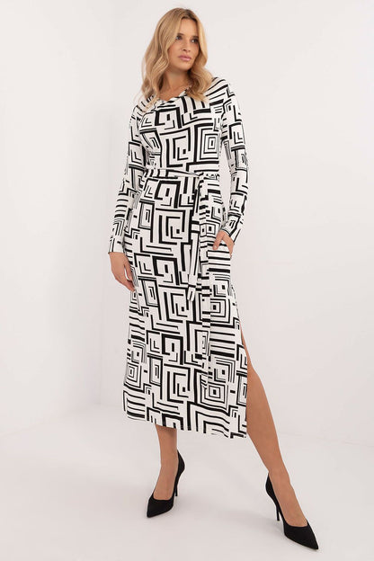Elegant midi pencil dress with geometric pattern by Lakerta, featuring long sleeves and waist tie, ideal for everyday wear and special occasions.