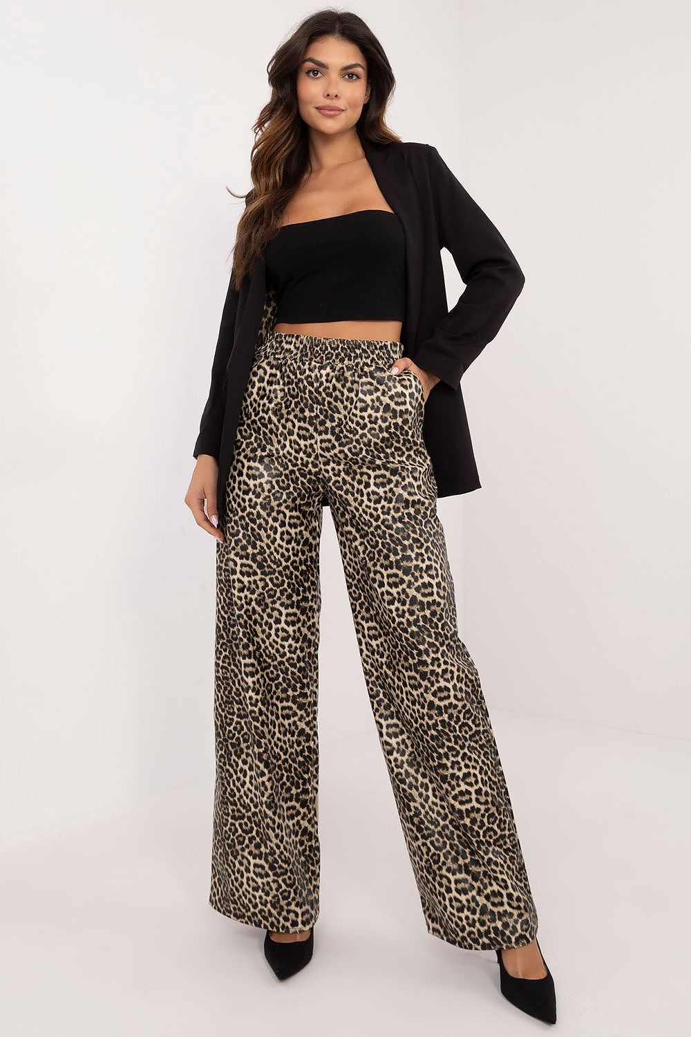 Elegant eco-leather women’s trousers with a striking animal motif by Lakerta, featuring a high waist, functional side pockets, and a sophisticated casual style, available in sizes S/M and L/XL.