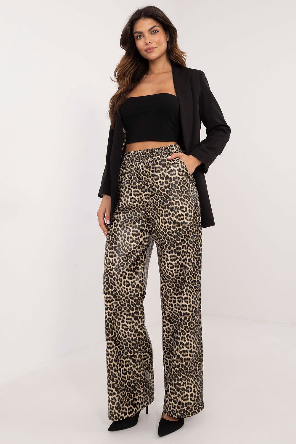 Elegant eco-leather women's trousers featuring a striking animal motif, designed by Lakerta, showcasing a high waist and side pockets for added functionality in a luxury fashion statement.