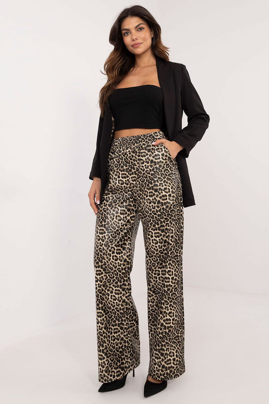 Elegant eco-leather women's trousers featuring a striking animal motif, designed by Lakerta, showcasing a high waist and side pockets for added functionality in a luxury fashion statement.