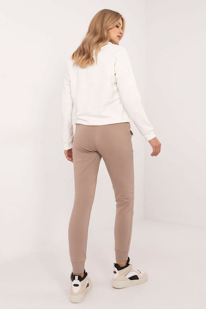Elegant Cotton Blend Women’s Set by Relevance, consisting of a fashionable sweatshirt with long sleeves and sporty high-waist pants with pockets.