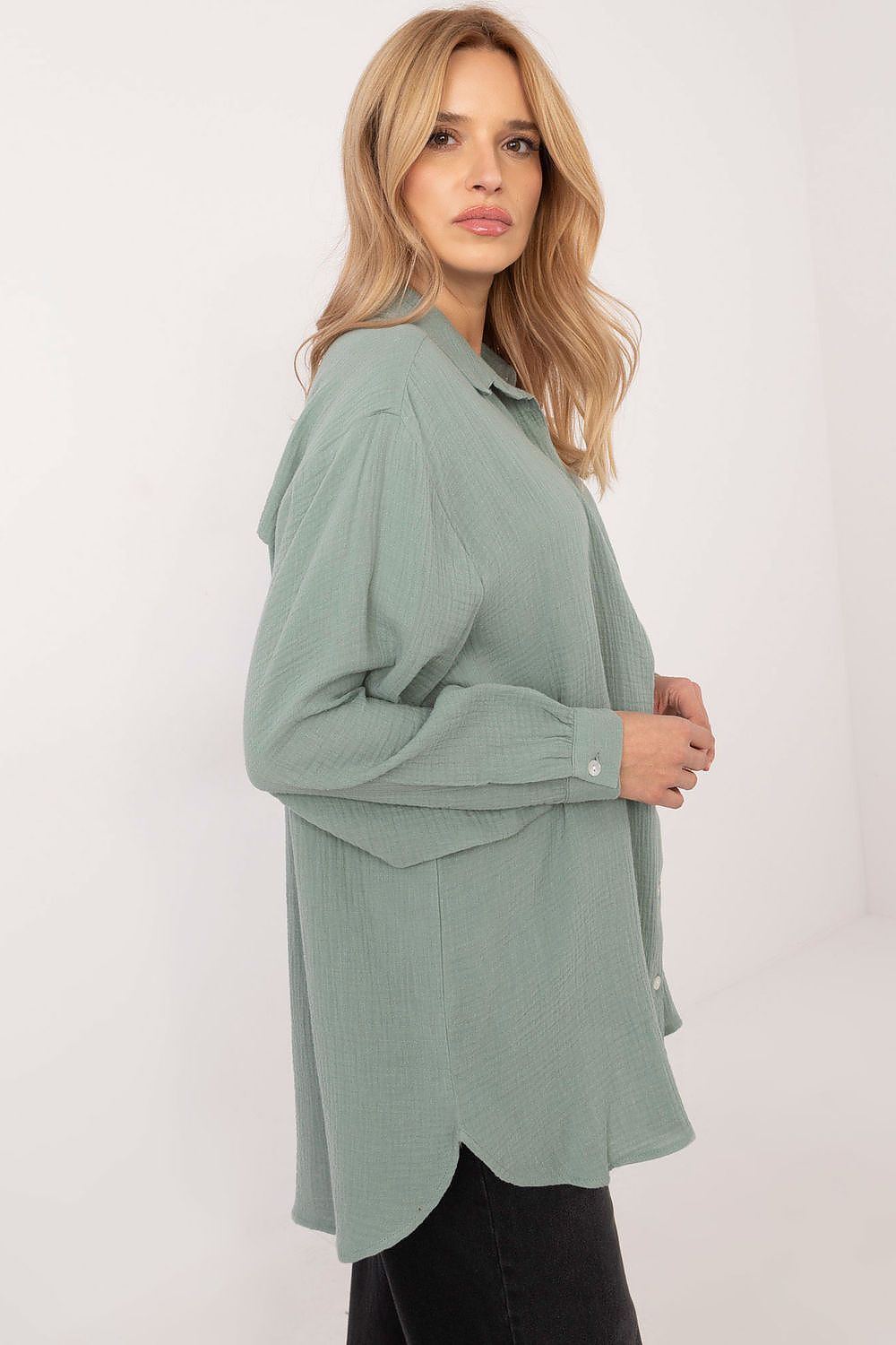 Sublevel's sophisticated long sleeve casual shirt featuring a romantic design and delicate buff sleeves, made from 100% organic cotton.