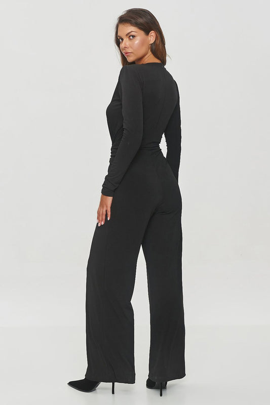 Elegant black jumpsuit by Makadamia featuring a V-neck, classy shoulder pads, and twisted knot waist, designed with wide legs for a sophisticated look, available in sizes EU 36 to 42.