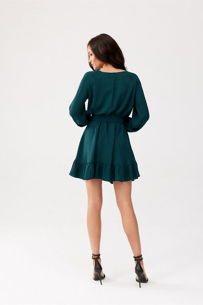 Close up of the Sintra Dress by Roco Fashion highlighting the soft fabric and feminine ruffled hem.