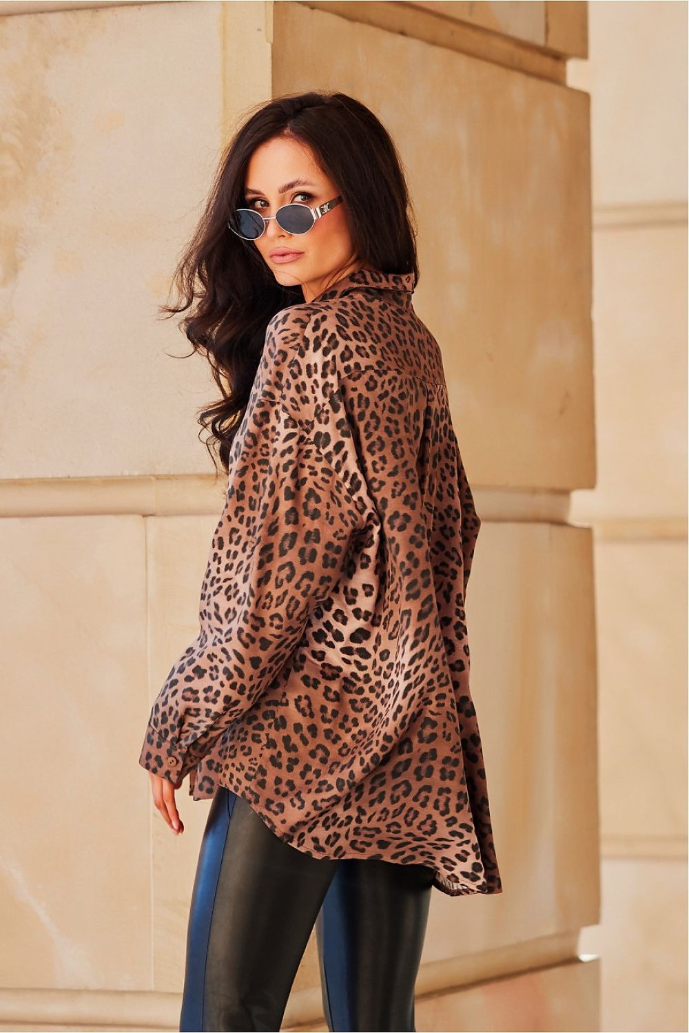Elegant Roco Fashion long sleeve shirt featuring a stylish animal print design, crafted from soft 100% viscose, with a classic collar and cuffed sleeves for a luxurious touch.