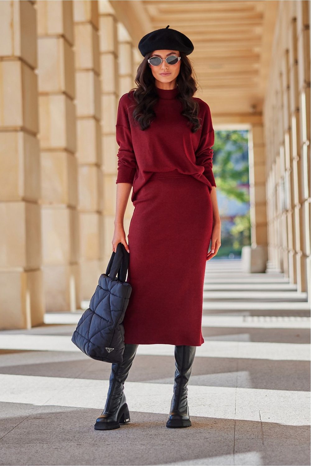 Model wearing the Lydia Blouse by Roco Fashion, paired with a chic skirt, exhibiting a fashionable fall outfit perfect for cooler weather.