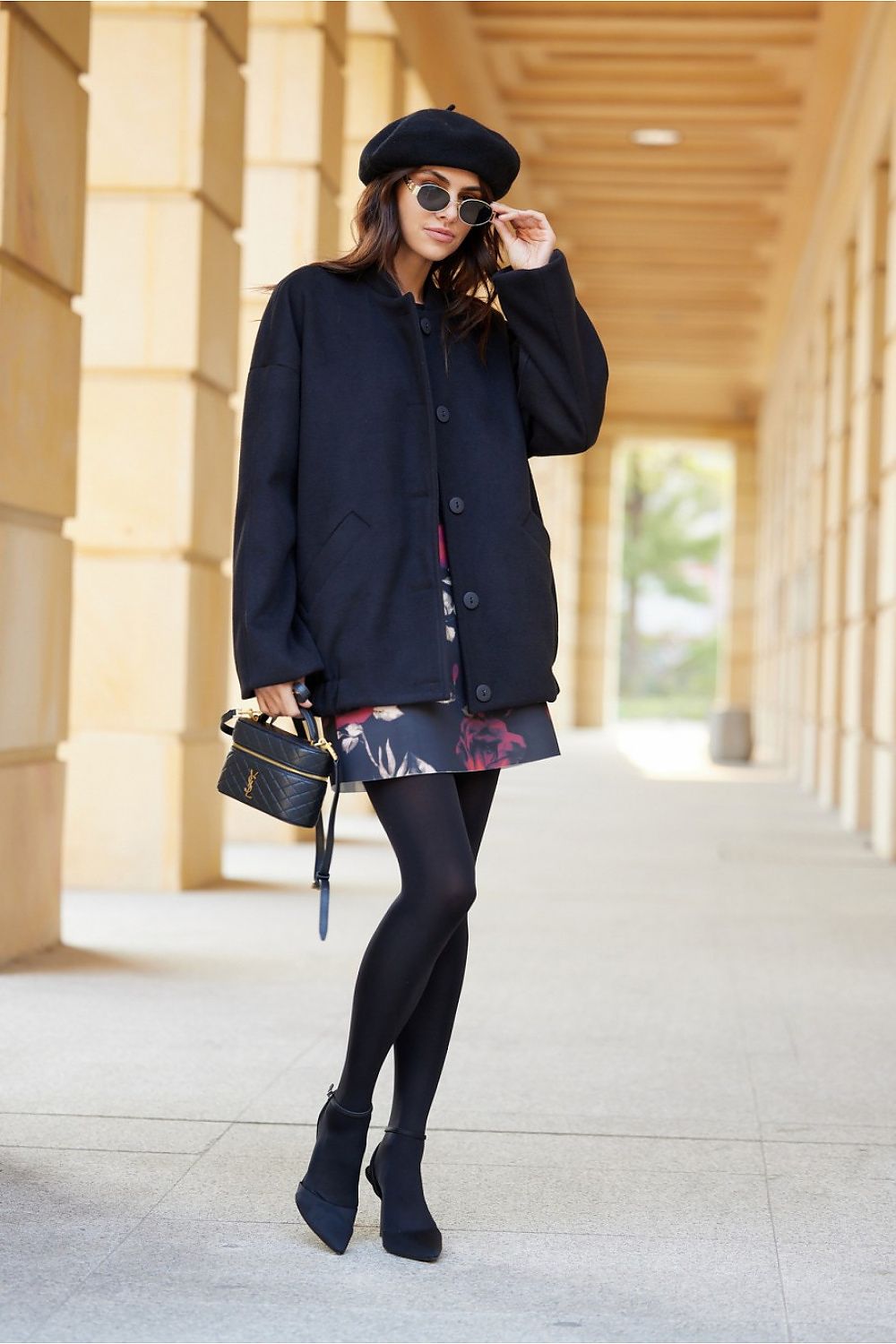 Roco Fashion Clea Jacket displayed with a model, highlighting its warm material and fashionable silhouette, perfect for any season.