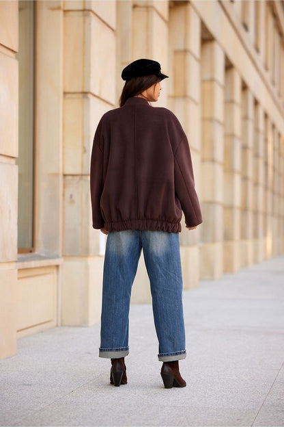 Roco Fashion Clea Jacket featuring a relaxed fit with a dropped shoulder design, functional side pockets, and delicate gathering at the bottom, perfect for chic everyday styling.