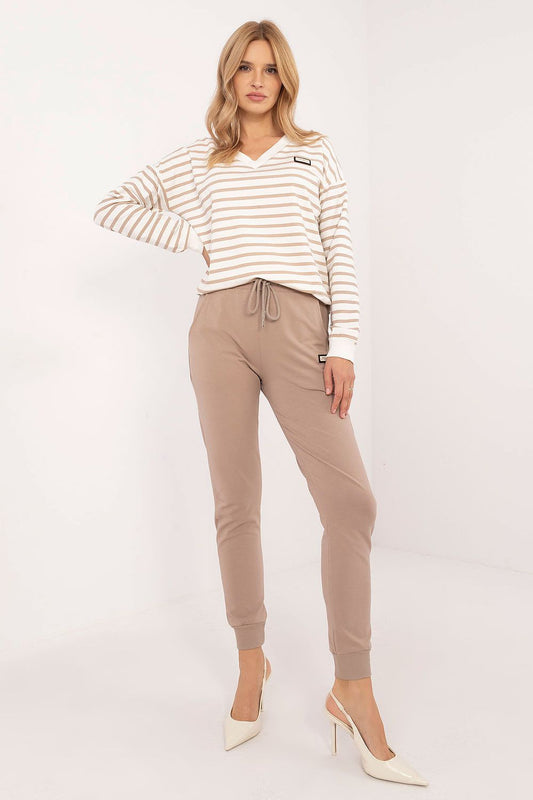 Elegant and casual women's cotton blend tracksuit set by Relevance, featuring a long-sleeved V-neck blouse and high-waisted pants, perfect for stylish everyday wear.