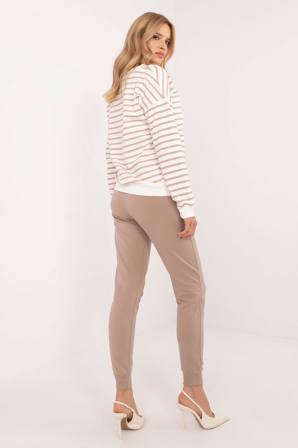 Stylish women's cotton blend tracksuit set by Relevance featuring a long-sleeved V-neck blouse and high waist pants, perfect for elegant everyday wear.