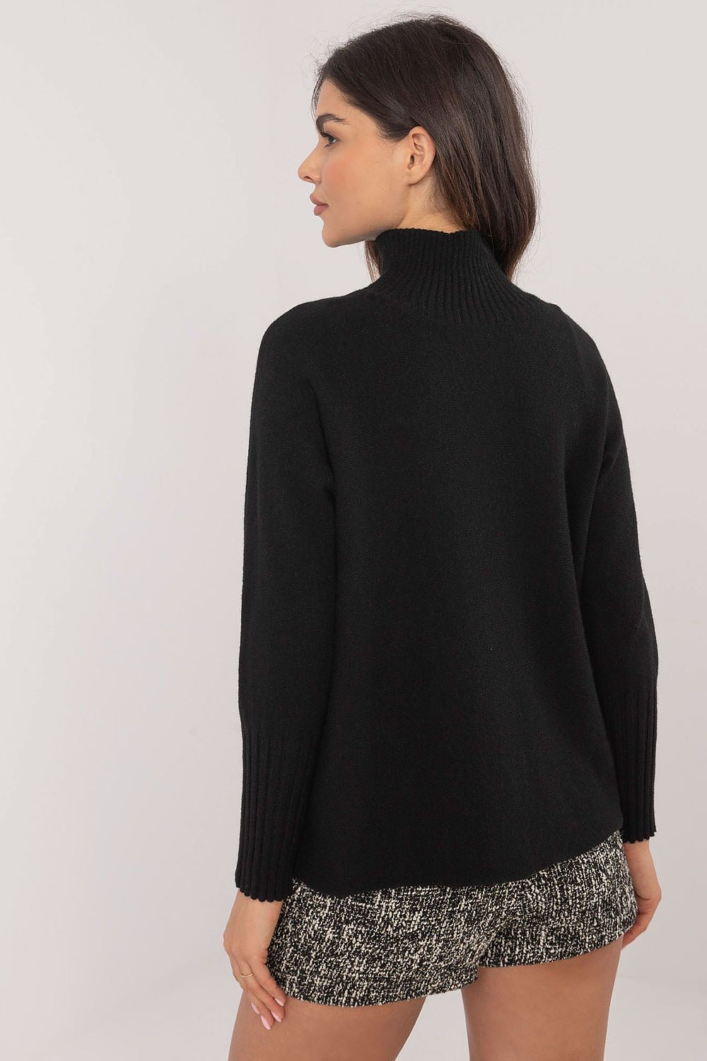 Stylish women's turtleneck sweater by BFG with long sleeves and wide cuffs, ideal for sophisticated casual wear.